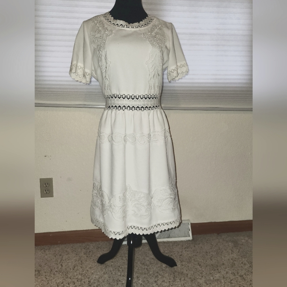 The cutest boho dress kind of off white worn once and dry cleaned